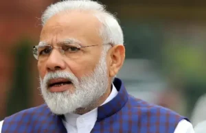 Ponieważ INR osiąga rekordowo niski poziom, Modi optymistycznie podchodzi do fundamentów gospodarczych i rezerw